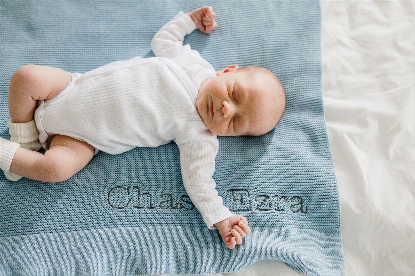 100% cotton knit baby blanket, designed in Canada.  Monogrammed baby blanket, with a name embroidered.  Something Personalized.  Adorable baby with baby blanket.