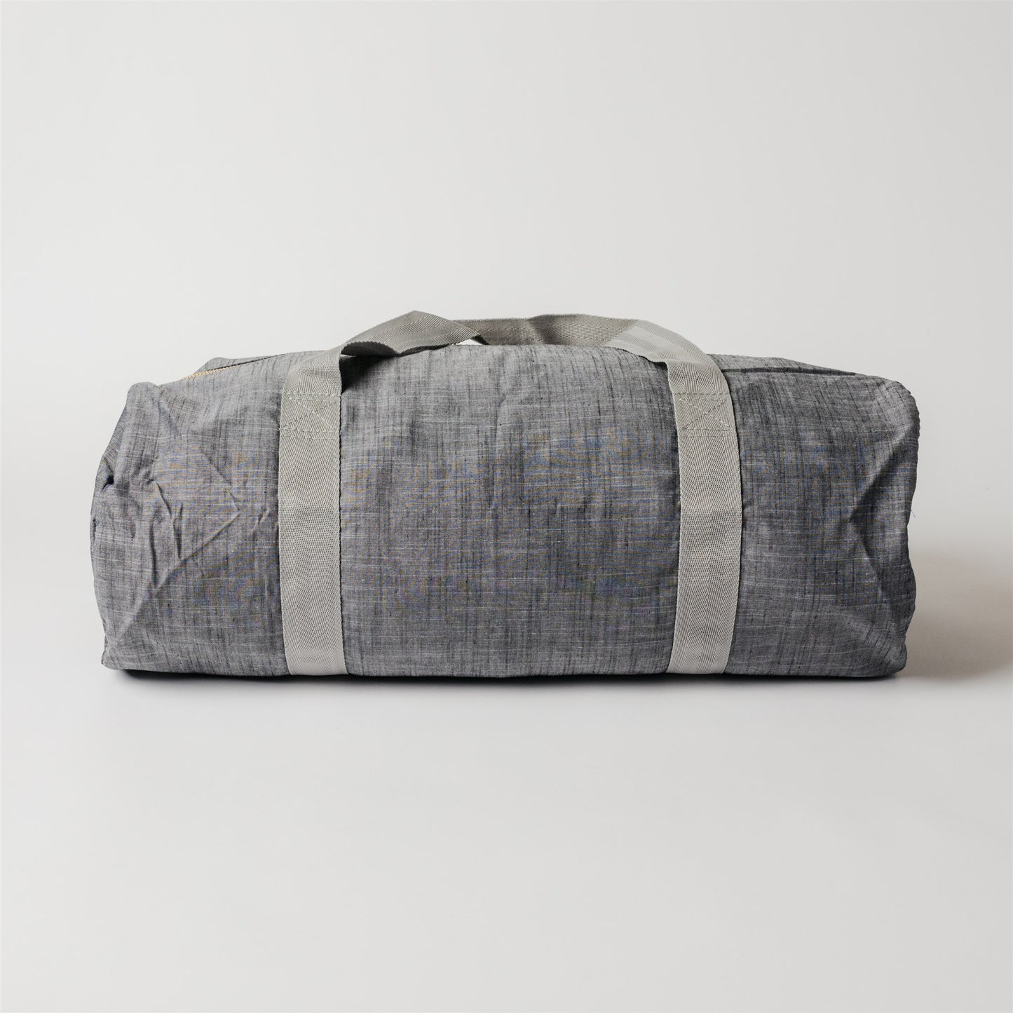 Load image into Gallery viewer, Grey Chambray and Brass Weekend Duffel Bag
