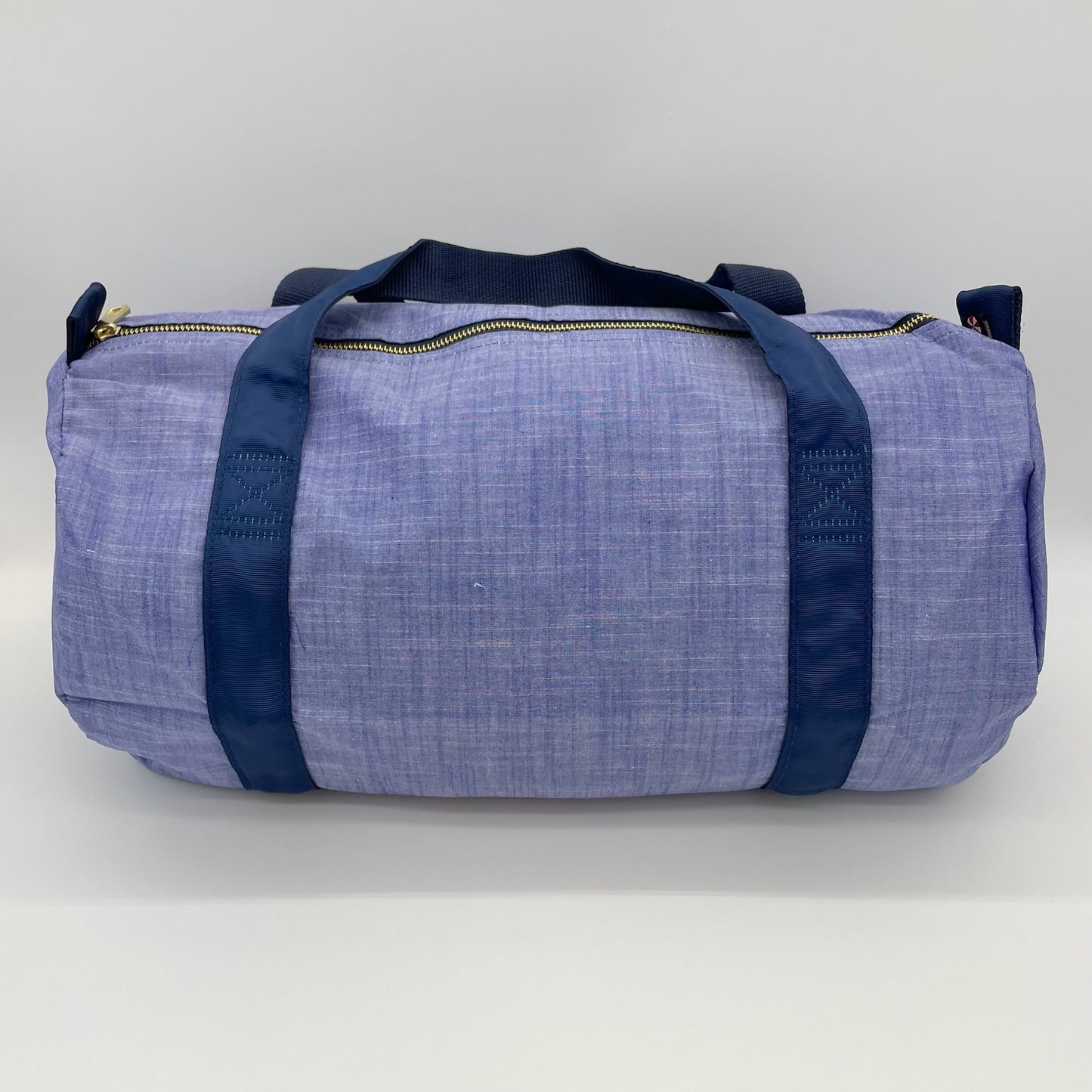Load image into Gallery viewer, Navy Chambray and Brass Medium Duffel Bag
